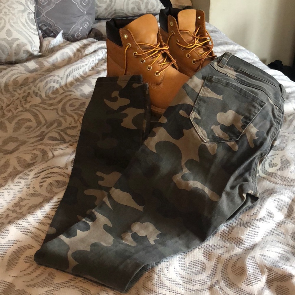 Distressed camo jeans